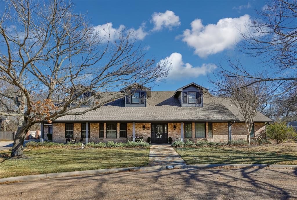 Welcome to this stunning entertainer’s dream home on a beautifully treed lot, with its exceptional four-bedrooms, six-bathrooms designed with both elegance and entertaining in mind. From the moment you arrive, you will be captivated by the home’s thoughtful layout, soaring ceilings, and abundance of natural light.  At the heart of the home is a gourmet kitchen featuring granite countertops, commercial grade, high-end appliances, including a Sub-Zero refrigerator and a Viking range, a massive center island and premium finishes that are perfect for hosting gatherings of any size. The open yet well-defined floor plan flows seamlessly into a formal dining room, inviting living room with custom built-ins, cozy den, dedicated office, and a stylish wet bar, making this home ideal for both everyday living and special occasions.  Each spacious bedroom offers the privacy of its own en-suite bath. The luxurious primary suite is a true retreat, boasting a spa-like walk-in shower and private walk-out patio that leads directly to the resort-style outdoor living area. Step outside to enjoy the beautifully designed entertaining space complete with a swimming pool and spa, perfect for relaxing or hosting unforgettable gatherings. Adding incredible versatility is a full-size guest house featuring its own kitchen and bathroom ideal for visitors or multigenerational living. Additional highlights include a spacious laundry room, oversized garage, abundant additional storage, separate storage building, greenhouse, and sprawling mature trees that offer both privacy and charm. This property truly has it all—comfort, luxury, and endless possibilities! A rare opportunity to own a home that blends refined living with exceptional entertaining spaces, inside and out!