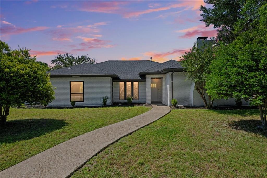Urban living meets modern comfort in this completely remodeled, dual-primary suite home located just minutes from Downtown Dallas & White Rock Lake. Tailormade for established professionals, growing families, & buyers seeking a vibrant, highly connected lifestyle, this move-in-ready property seamlessly blends sophisticated entertaining spaces with flexible living options. Designed for Entertaining & Versatility Gourmet Chef's Kitchen features premium stainless-steel appliances & an expansive L-shaped island that naturally anchors the home. Dual Living Areas offer ultimate flexibility, including a cozy lounge with vaulted ceilings & a centered brick fireplace, alongside an open family room with direct sightlines to the kitchen & backyard patio. Sophisticated Finishes Boasts long-plank laminate flooring, updated light fixtures, new interior doors, & custom window blinds throughout. Luxurious Multi-Suite Layout Primary Oasis is a spacious sanctuary boasting an oversized bathroom with a double walk-in rain shower, standalone soaking tub, & a custom multi-level closet filled with natural light. Secondary Primary Suite is the crown jewel of the layout, offering an ideal setup for multi-generational living, long-term guests, or an executive home office space. Jack-and-Jill Wing features two additional generously sized bedrooms share a smart Jack-and-Jill bathroom featuring dual sinks & a private shower door. Turnkey Peace of Mind & Premium Location with Major Capital Upgrades that allows you to joy immediate worry-free living with a newer roof, upgraded electrical panel, new water heater, & energy-efficient double-pane windows with blinds. Outdoor Space is manageable backyard is sized perfectly for weekend gatherings & low-maintenance urban living. Nestled within walking distance to Everglade Park & Pool, Buckner Terrace Montessori & Skyline High School, keeping you just an effortless commute away from the heart of the city. Buyer closing cost considered at full price.