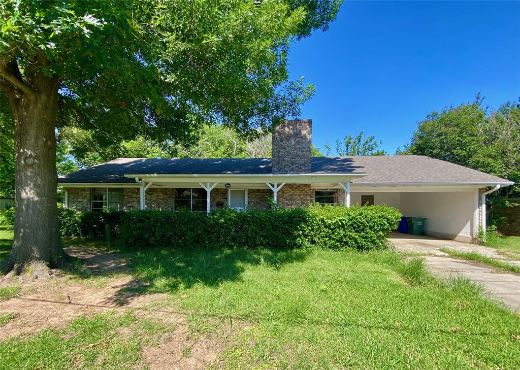 Endless Possibilities! Spacious 2 Bed, 2 Bath Brick Home with 2 BONUS ROOMS and covered parking on oversized lot**

Welcome to your next project! This roomy 2 bedroom, 2 bath brick home is brimming with potential. Enjoy a bright and airy living area with a classic fireplace. Both bedrooms are generously sized, and the home features large rooms throughout, offering plenty of space to spread out.

In addition to the main bedrooms, you’ll find two versatile bonus rooms—ideal for a home office, playroom, or extra bedrooms to suit your needs. Step outside to a large covered back porch, perfect for relaxing, entertaining, or enjoying the peaceful, tree-shaded backyard. The attached covered parking provides extra storage or workshop potential, while the huge lot is perfect for outdoor living, pets, or play.

Located in a nice neighborhood just steps from the park, you’ll love the peaceful setting and convenient location. With a flexible floor plan, this home could easily be converted into a 4 bedroom to accommodate a growing family or guests.

While it does need some repairs and updates, it’s a fantastic fixer-upper opportunity for investors or anyone looking to create their dream home. Don’t miss your chance to transform this property into something truly special!