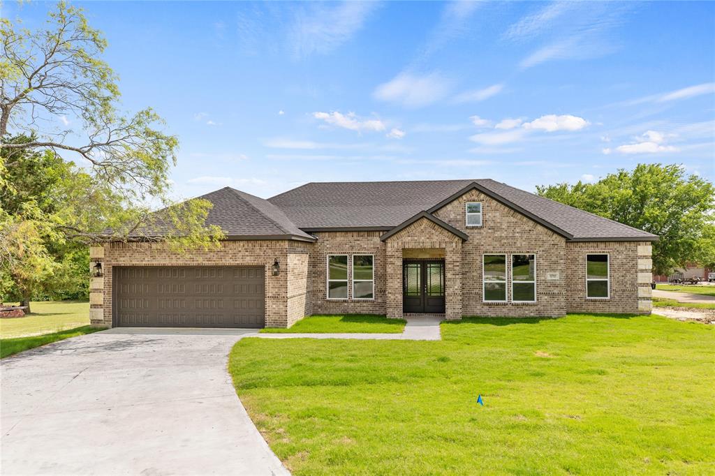 LAKE TAWAKONI WATERFRONT RETREAT (QUINLAN, TX): SELLER OFFERING UP TO $30,000 CONCESSION towards a 3-2-1 INTEREST RATE BUYDOWN on this home! LIVE THE LAKE LIFE! NEW CONSTRUCTION WATERFRONT RETREAT ON LAKE TAWAKONI WITH 1.7+ ACRES IN SOUGHT-AFTER WATERS EDGE! Escape to a world where serene water views, private tree-lined property, and modern luxury converge. Nestled within the coveted Waters Edge community, this newly completed custom home is a masterpiece of design, now back on the market after a refresh. Step inside and discover an expansive 2,380 sq. ft. open floor plan with gleaming hand-scraped hardwood floors, a gourmet kitchen featuring pristine quartz countertops and upgraded cabinetry, and panoramic windows framing the shimmering lake. This layout includes 4 spacious bedrooms, 2.5 luxurious bathrooms, and a dedicated home office. Your private paradise extends across 1.7+ acres with a tranquil pond. The property gently slopes to the shoreline, where an SRA leaseback provides the canvas for your dream dock and boathouse. Enjoy exclusive access to a private gated marina and boat launch in the Waters Edge community, just a short walk or golf cart ride away. 

MAXIMIZE YOUR SAVINGS The sellers contribution (up to $30,000 on this home) is structured to provide a temporary 3-2-1 interest rate buydown, resulting in significant initial savings. The estimated TEMPORARY rate structure is: 3.5% in Year 1, 4.5% in Year 2, and 5.5% in Year 3, with the permanent rate settling at an estimated 6.5% for Years 4-30. (NOTE: These quoted interest rates are not the Annual Percentage Rate (APR).) The full $30,000 covers the buydown cost, with remaining funds available for buyer closing costs prepaids. The total seller concession will be reflected on closing documents up to 6% of the sales price, based on the final contract.