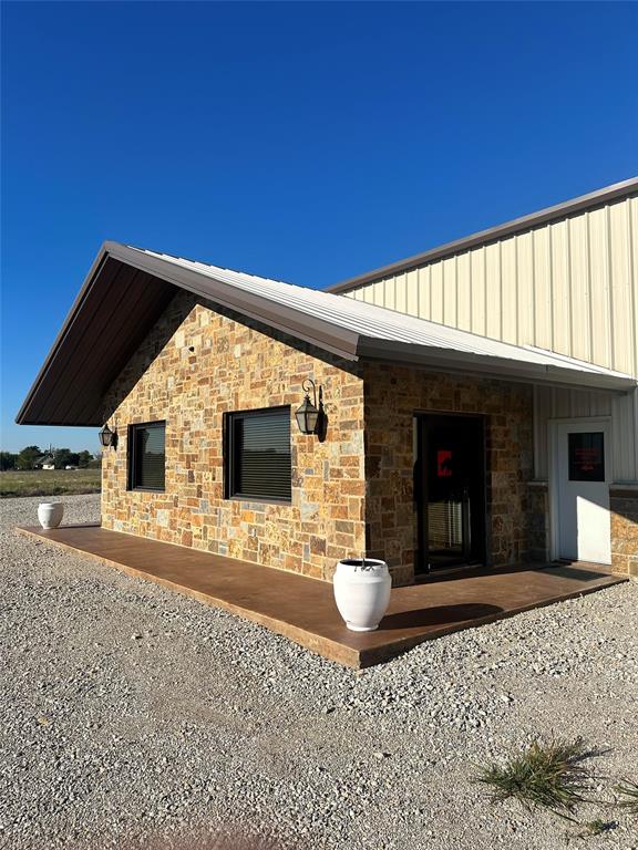 Industrial property with great potential and SELLER FINANCING available. Just under 15 acres with good access and room to develop. Industrial building with 2800sqft of office space and an additional 2200sqft to expand. 3600sqft of shop space. 18’ side walls with 12x14 and 14x14 grade level doors, a shop bathroom and eyewash station for OSHA compliant workspace. Parking and industrial yard is secured inside a fenced area. The yard includes an approximately 40’ x 80’ equipment shed. The secondary yard has an approximate 24’ x 60’ covered area with a 40’ x 40’ shop on the end. The property is situated with a drive next to the primary building and yard to allow access to develop additional space.