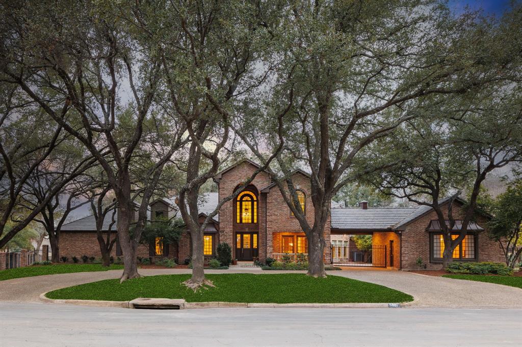 Prestigious Living in Preston Trails: This exquisite 5-bedroom, 6-bathroom estate epitomizes luxury in Far North Dallas. Spanning a lush .83-acre lot with panoramic golf course views, this two-story home offers over-the-top amenities, with most of the expansive living space conveniently located on the main floor. Step inside to discover gorgeous views of the lot and golf course through floor to ceiling windows.  The updated kitchen comes with a commercial-grade stove, dual ovens plus warming tray, dual sinks and dishwashers, built in refrigerator and a built in Miele coffee maker. Two bedrooms, a flex room with a sauna and steam shower, and a media room with plush recliners and projection system define the ground floor. Upstairs, two ensuite bedrooms with a game room and bar open onto a vast balcony overlooking the outdoor living area and golf course. The lot features beautiful mature trees in both the front and back.  The backyard oasis features a sparkling pool, spa, outdoor kitchen, and a fire pit, all designed for outdoor living.  Additional perks of the home include detached guest quarters with kitchenette, 529 sqft, and a separate studio space, 588 sqft, NOT INCLUDED IN SQUARE FOOTAGE. With its unbeatable location next to Preston Trail Golf Club, this property is a rare find. Contact the listing agent for a private tour.