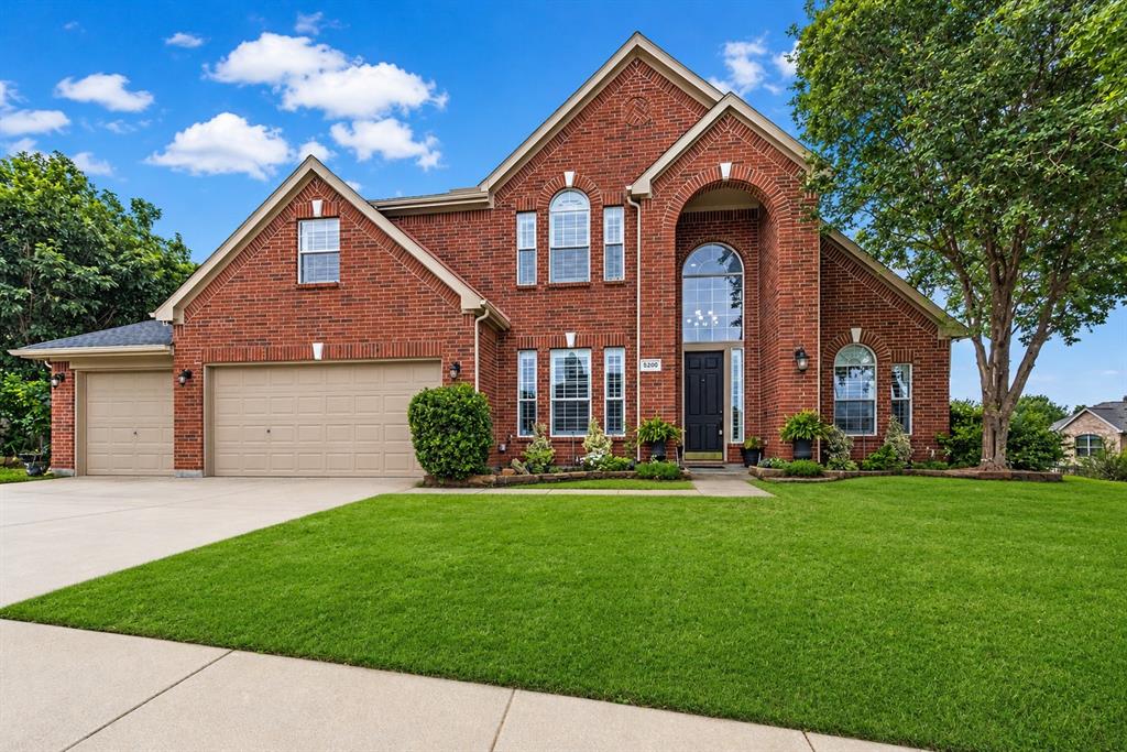 *READY FOR MOVE IN!!*5 BEDROOMS!!*3-CAR GARAGE!!*CORNER LOT ON APPROX. QTR ACRE!!*  Keller ISD  Welcome to this beautifully updated 5-bedroom, 3-bath home in the desirable Villages of Woodland Springs community, known for its exceptional amenities & prime location. Situated on a spacious corner lot, this home offers a flexible layout with room for everyday living, entertaining, & working from home. Featuring all new paint & fresh new carpets, the home offers a clean, move-in ready feel with soaring ceilings, extensive wood flooring, abundant natural light, and inviting living spaces throughout. Just off the entry is a dedicated office with French doors, ideal for working from home or additional flexibility. The living room features tall windows with plantation shutters, a gas fireplace, & an open into the kitchen & breakfast nook. 

The kitchen offers abundant cabinetry, granite countertops, breakfast bar seating, built-in microwave and oven, pantry, & a separate butler’s pantry area for addt'l prep and storage space. The breakfast nook is surrounded by large windows overlooking the backyard, while the formal dining room provides additional space for gatherings & entertaining.

The functional floor plan includes 2 bedrooms & 2 full baths on the main level. The spacious primary suite features plantation shutters & an updated bath with dual vanities, extensive storage, & a large dual-head walk-in shower. Upstairs you’ll find 3 addt'l bedrooms, a full bath, & an oversized flex room that works well as a game room, media room, or second living area. Two upstairs bedrooms also have direct walk-through access to attic storage space.

Outside, the backyard features trees, an oversized stone patio, & plenty of space for pets, play, or entertaining. Residents enjoy access to community pools, parks, playgrounds, & walking trails, all conveniently located near shopping, dining, schools, & major roadways.