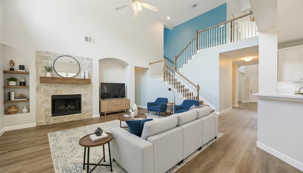 Welcome home to this beautiful brick residence in highly sought-after Mansfield ISD, offering an ideal blend of style, space, and functionality. Fresh luxury vinyl plank flooring throughout the main level creates a warm, modern feel, while the inviting living room features soaring ceilings and a cozy fireplace with gas logs as its centerpiece. The spacious eat-in kitchen is designed for both everyday living and entertaining, showcasing stainless steel appliances, a farmhouse sink, subway tile backsplash, and bright white cabinetry that provides an elegant look. Retreat to the generously sized primary suite, complete with a relaxing garden tub, separate shower, and a large walk-in closet. At the front of the home, formal living and dining rooms offer flexible spaces for hosting guests, a home office, or additional seating areas. Additionally there is a completely renovated half bathroom. Upstairs, you'll find incredible versatility with two additional living areas that can easily serve as a playroom, media room, game room, home gym, or workspace. Three secondary bedrooms provide plenty of room for family and guests. Step outside to enjoy the private backyard featuring a large covered patio and hot tub, perfect for outdoor dining, entertaining, or simply relaxing year-round. Ideally located near top-rated schools, shopping, dining, and everyday conveniences, this exceptional home offers the space, updates, and location you've been looking for. Don't miss the opportunity to make it yours!