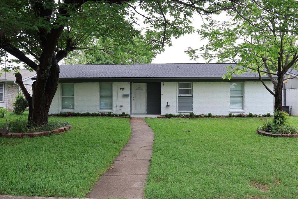 This stunning 1,424 sq. ft. residence is the perfect blend of modern sophistication and worry-free living. Having undergone a complete professional renovation just 3 years ago -and with roof replaced just 1 month ago-, every corner of this 3-bedroom, 2-bathroom home feels fresh, stylish, and brand new.

Key Highlights:
Worry-Free Exterior: Rest easy with a brand-new roof (2026) and fresh, modern exterior paint that provides instant curb appeal.

Modern Kitchen: The heart of the home features custom gray shaker-style cabinetry, elegant countertops, a classic subway tile backsplash, and a full suite of stainless steel appliances.

Open Concept Living: Enjoy the spacious, light-filled living area featuring vaulted ceilings, recessed lighting, and a sleek modern fireplace.

Designer Finishes: Luxury vinyl plank flooring flows throughout the home, complemented by matte black fixtures and contemporary gray-toned doors and trim.

Remodeled Bathrooms: Both bathrooms feature high-end, large-format marble-style tiling and modern vanities for a true retreat experience.

Practical Features:
Updated Mechanics: The central AC keeps you cool in the Texas heat, and the electric water heater was replaced in 2025.

Storage & Parking: This property boasts rare versatility with an attached garage PLUS a carport. The backyard includes a stone-paved walkway and a dedicated shed for all your storage needs.

Dedicated Laundry Room: A functional utility space with built-in shelving and stylish patterned tile flooring.

Located in a quiet, established neighborhood with mature trees, this home boasts the high-end feel of a new build without the wait.

Don't miss your chance to own this Garland gem! Some photos have been virtually rendered.