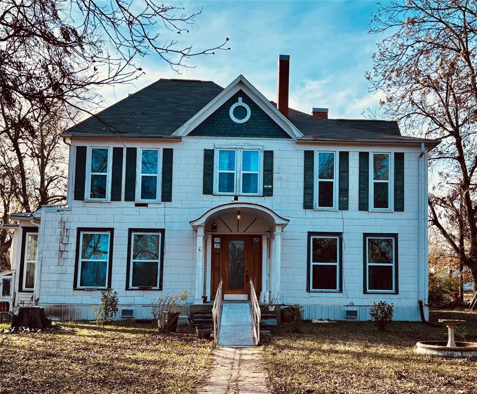 Own a piece of history with this 1905 home that is currently undergoing renovations.  With the large lot, you could easily build another property. The owner has completed all major repairs, allowing you to add your personal touch to the property.  Updates include: New electrical throughout the house, new plumbing, foundation work completed 2023, new water heater 2024, 40 total new windows installed 2023, blown insulation 2023, remodeled bathroom, dining room, and kitchen including lots of upgrades.  Roof replaced July 2024.  This home is ready for you to make it your own.