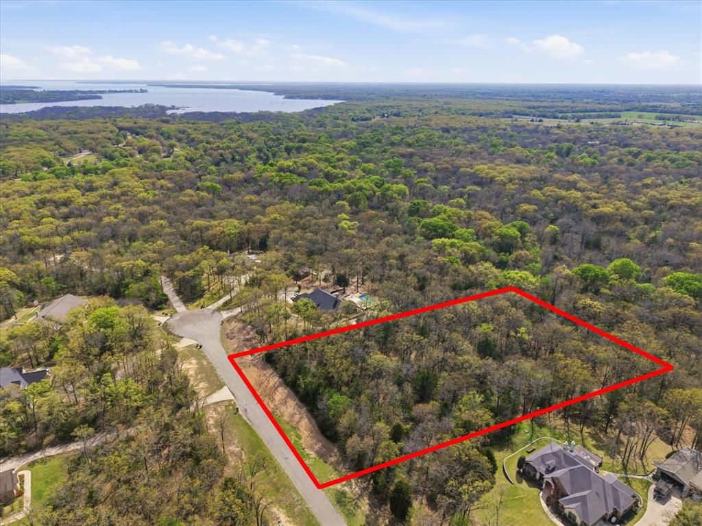 Rare opportunity to own a 2-acre wooded homesite in Cedar Oaks, Greenville, Texas, one of the area’s most exclusive and highly sought-after neighborhoods. Opportunities like this are exceptionally hard to find, especially in a community where no additional lots remain available. Tucked away on a cul-de-sac at the back of the neighborhood, this beautiful property offers the kind of privacy, peace, and prestige that buyers are searching for. Surrounded by mature trees and custom homes, this lot delivers a secluded setting with the perfect blend of elegance and nature. Located in Lone Oak ISD, this property is ideal for buyers looking to build a custom dream home in a refined neighborhood with rare home site opportunities. Whether you envision a private estate tucked beneath the trees or a stunning modern farmhouse with room to breathe, this lot offers a rare chance to create something special in an established, exquisite community. If you’ve been searching for land for sale in Greenville, TX, luxury lots in Lone Oak ISD, or a private wooded lot in Cedar Oak, this one stands apart.