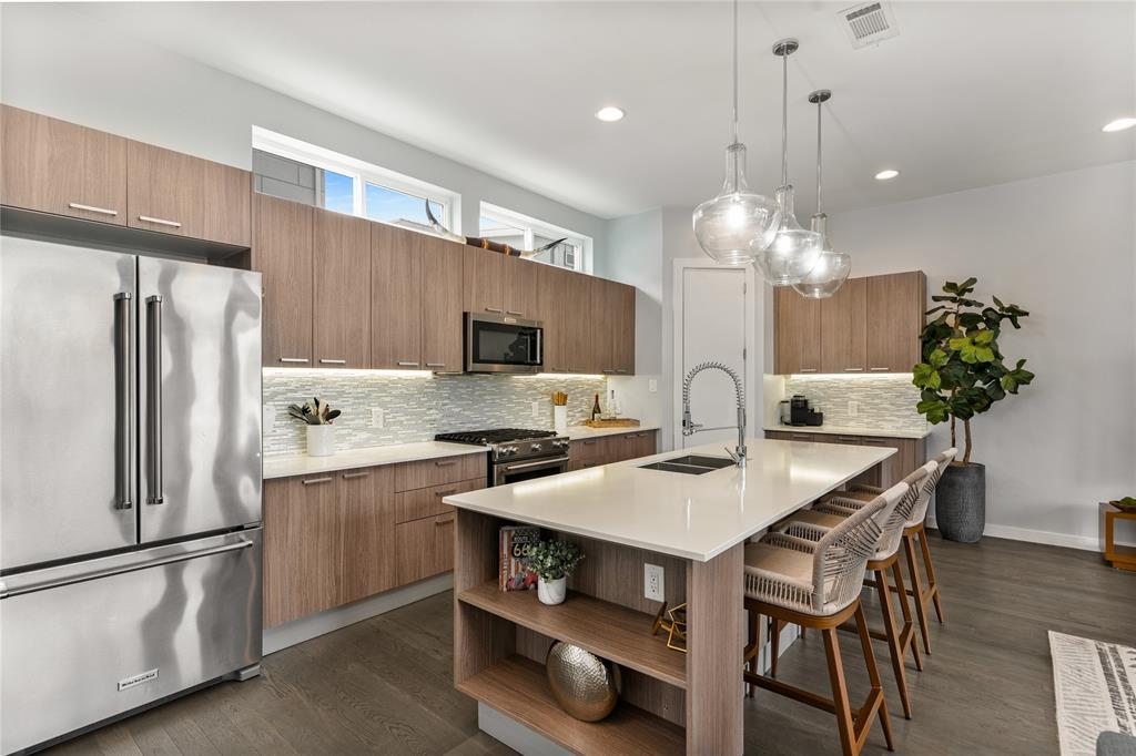 Welcome to 4935 Zuma Court — a stunning and modern townhome tucked inside the gated Bennett Place community, right in the heart of one of Dallas’ most vibrant neighborhoods. This 3-bedroom, 3.5-bath home offers just over 2,000 square feet of thoughtfully designed living space, with each bedroom featuring its own private en-suite bath, plus an additional powder room for guests.

What truly sets this home apart is the location. Nestled between Henderson Avenue and Lower Greenville, you’ll be just steps from some of Dallas’ best restaurants, rooftop patios, craft cocktail bars, live music, and boutique shopping. Living here means trading long commutes for morning coffee strolls, late-night dinners, and everything in between.