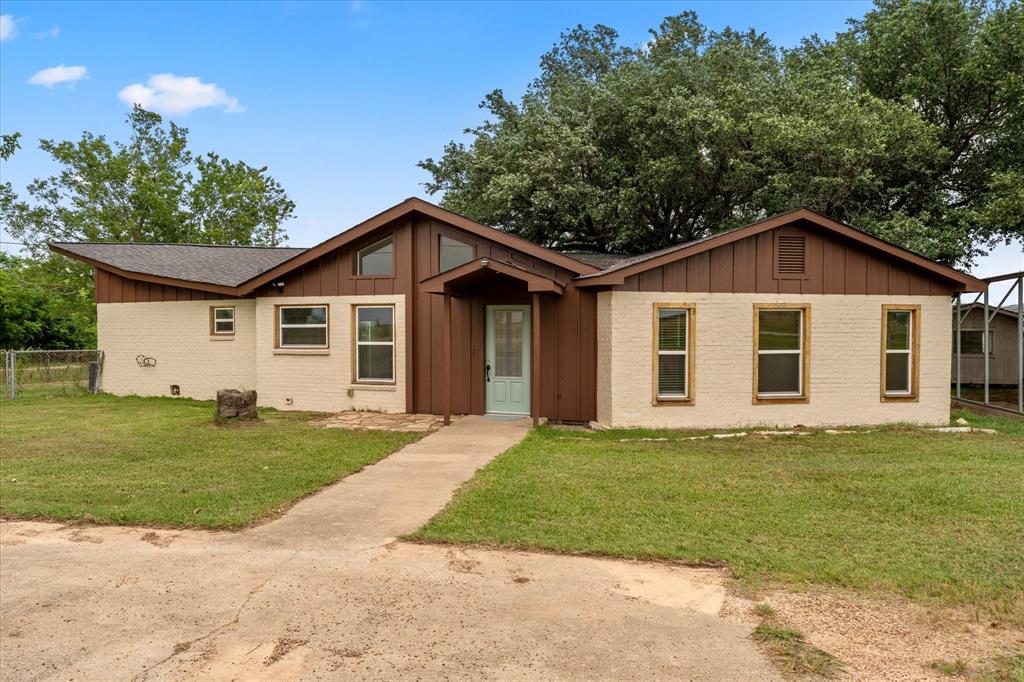 BEAUTIFULLY REMODELED 3 BEDROOM 2 BATH HOME ON THREE LOTS .69 ACRE IN A WONDERFUL WATERFRONT AREA. BOAT LAUNCH AND LAKE LOCATED BEHIND THE PROPERTY. HOME HAS FRESH PAINT, PORCELAIN WOOD TILE, NEW CARPET, PRETTY KITCHEN AND BRICK FIREPLACE.HAS BUILT-INS, LOTS OF GLASS, NICE MASTER BATH WITH SEPARATE TUB AND SHOWER. LARGE TREES, NICE 1 CAR GARAGE WITH ATTACHED CARPORT, CIRCLE DRIVE, LARGE SHE SHED AND SEPARATE STORAGE BUILDING. GREAT PROPERTY, ENJOY THE LAKE WITHOUT THE TAXES.