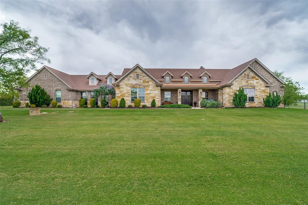 Beautiful Texas ranch style house located on 2 acres in Maravilla Estates (No HOA and high-speed internet,) this property features a stunning main home and well-appointed guest home. As you step into the main house, you will be impressed by the ceiling beam, massive stone fireplace and the stunning open kitchen. This 4008 square foot one story home makes entertaining easy with its open floor plan, impressive pantry, and huge private game room. 4th bedroom being utilized as an office and exercise room. The guest house features a large kitchen with an inviting eat at island, living room, bedroom, laundry room with full size W-D hookups. There is a flex room that is currently being used as an extra bedroom.  The garage-shop area has two garage doors that can easily fit two cars or multiple ATVs. The backyard features a beautiful fire pit perfect for smores, and abundance of mesquite trees that offer privacy and room for a pool.  Maravilla is a vibrant and welcoming community.  In the documents are designs for a custom pool, bar and putting green.