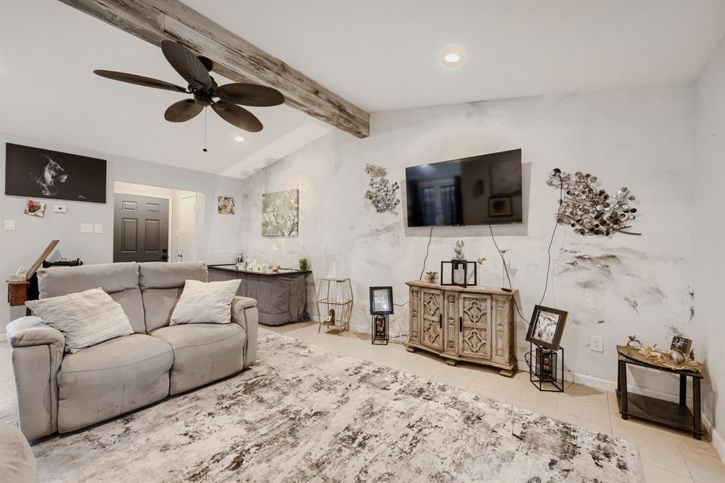 This one is proof that good things come in small packages, and this updated duplex home is turning heads for all the right reasons. From the moment you walk in, the soaring beamed ceilings with recessed lighting set the tone, bright, airy, UNIQUE accent wall, and full of character that you just don't expect at this price point. The kitchen? Granite countertops, breakfast bar, open to the dining area, and finished with the kind of detail that makes you do a double take. Granite in the bathroom too, because why not? Tile flooring throughout keeps things sharp and easy to maintain. The primary bedroom has direct access to the full bath. Fenced backyard and a detached carport out back seal the deal. Updated. Move-in ready. No HOA. And the location makes it even better. You're just 15 minutes from Dallas, sitting between I-35E and I-45 just south of I-20, three interstates and big city access without the big city price. Lancaster's Historic Town Square brings local dining, shopping, and live entertainment right to your backyard. Zoned to Lancaster ISD.First-time buyer? Investor? Downsizer? This one works for all of the above. Come tour it before someone else does! 

Current interest rate may be assumable.  Discounted rate options and no lender fee future refinancing may be available for qualified buyers of this home.