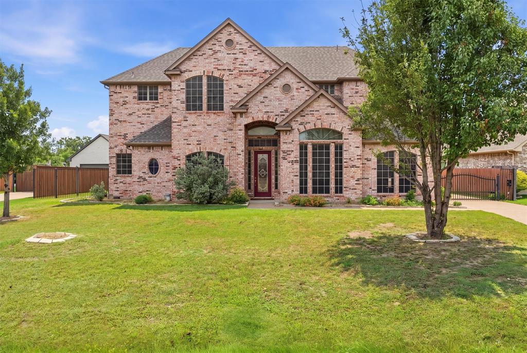 Welcome to this stunning 4,000 sq. ft. open-concept masterpiece situated on a sprawling 0.6-acre lot. Designed for effortless entertaining and multi-generational living, the home features two spacious bedrooms downstairs and a massive chef’s kitchen , a large center island, an oversized pantry, a built-in wine chiller, and two separate ovens and stovetops. Upstairs, escape to a spectacular, private Owner's Suite complete with a dedicated attached office space, a massive walk-in closet, and a private balcony. The second floor also features a large second living loft and a full guest suite. Step outside to your covered patio or enjoy the security of a fully fenced backyard with a solar-powered automatic gate and a 3-car garage. Excellent location with quick access to the Chisholm Trail Parkway for an easy commute!
