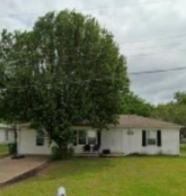 Charming 3-bedroom home in a rapidly developing Greenville neighborhood! Located at 6005 Colorado Street, this property offers around 1,200 sq ft of living space on a generous 9,000+ sq ft lot. The home features granite countertops, an electric stove, and washer and dryer connections conveniently located in the kitchen. The converted garage provides a spacious primary bedroom or bonus room, giving you flexible options for living, working, or additional rental income. The home has been successfully used as an income-producing property, with previous rents at over $1,400 per month. The large, fenced yard with chain-link fencing offers plenty of room for pets, outdoor activities, or future improvements. It presents a great opportunity for investors or buyers looking to add value. Built in 1975, the property sits in an area experiencing exciting growth, with many new homes being built nearby—a strong indicator of rising demand and future appreciation. The high school is within walking distance, and the location provides quick access to shopping, restaurants, the hospital, and major conveniences. A solid investment or starter home in an unbeatable location—don’t miss this opportunity! Seller will NOT finance. Home next door is for sale as well. Same layout. MLS #21138590
