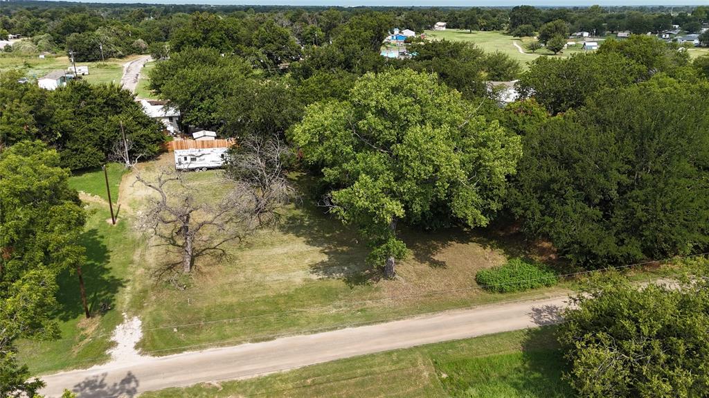 Welcome to Lots 12 & 13, a combined 0.40-acre slice of paradise near the beautiful Brazos River in the charming Horseshoe Bend community! This double lot is fully equipped with septic, water, and electricity, making it ready for your RV, weekend cabin, or future dream home. Surrounded by mature trees and complete with a small shed for storage, this peaceful setting offers both privacy and convenience.
Just minutes from the community boat ramp, you'll have easy access to the river for fishing, tubing, kayaking, and floating lazy summer days away. Horseshoe Bend is known for its laid-back vibe, outdoor recreation, and friendly, country-living charm.
An RV is currently on site and negotiable with the sale, giving you the option to start enjoying the property immediately!

Don't miss this opportunity to own a ready-to-go river retreat with all utilities in place—bring your plans, your boat, and your sense of adventure!