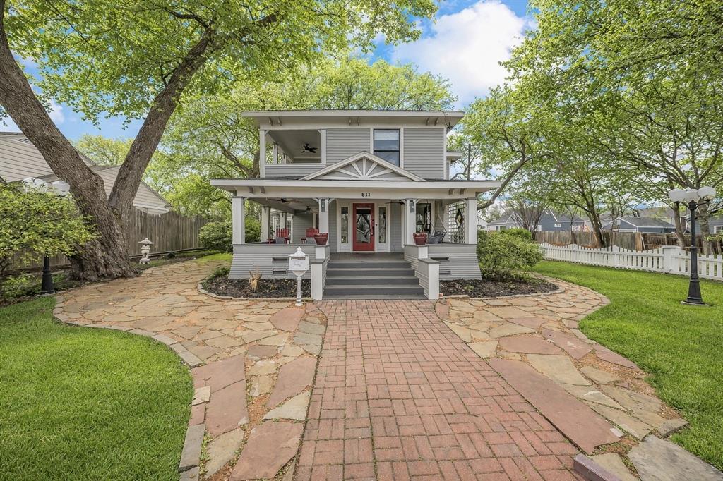 Known as “The Red Gate Inn,” this 4-bed, 4 full & 1 half bath property offers a rare investment opportunity in the heart of Downtown McKinney! This Airbnb-ready property is ideal for investors seeking to expand their portfolio and has previously operated as a successful Bed & Breakfast. Situated on a .41-acre corner lot within walking distance to McKinney Square, this historic home blends timeless charm with modern updates. The iconic red gate entry welcomes you to a flagstone patio and wrap-around porch complete with swing and multiple seating areas—creating an inviting first impression. Inside, remodeled spaces are filled with natural light and showcase hardwood floors throughout. The main house features 3 bedrooms, each with its own ensuite bath. The primary suite offers a beautifully remodeled bath with walk-in shower, vintage soaking tub, custom vanity and elegant sconce lighting. The expansive kitchen is designed for hosting, featuring stainless steel appliances including a Viking gas range, double ovens, vented hood, large island, granite countertops and built-in buffet. The kitchen flows seamlessly into the dining area and oversized living room with gas fireplace. Upstairs, two additional suites—“The Yellow Rose” and “The Blue Bonnet”—offer sitting areas and remodeled baths. The fourth bedroom suite is located above the detached two-car garage, complete with fireplace and full bath, perfect for extended stays or rental flexibility. Outdoors, the manicured grounds provide multiple gathering spaces, oversized yard, gazebo, and pool & spa. Whether you envision continuing its legacy as a Bed & Breakfast, operating a thriving Airbnb or enjoying it as a private estate, “The Red Gate Inn” offers unmatched versatility in one of McKinney’s most desirable locations. SELLER REPLACING ROOF AND ADDING GUTTERS TO MAIN HOUSE PRIOR TO A CLOSING. Call today!