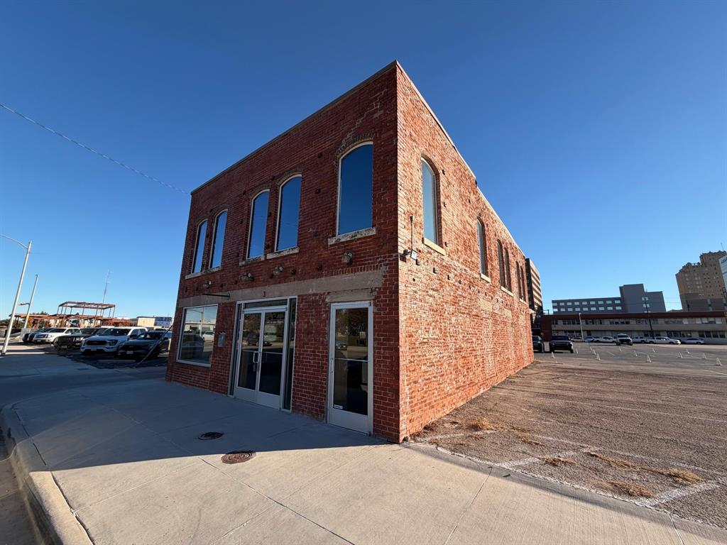 Prime commercial building in the vibrant heart of downtown Abilene, offering unmatched visibility and foot traffic just half a block east of the DoubleTree Hotel and directly south of the Abilene Convention Center. This standout property combines modern upgrades with an unbeatable location, having undergone a comprehensive renovation approximately ten years ago that included all-new electrical, plumbing, HVAC, windows, roof, paint, flooring, lighting, insulation, and an ADA-compliant restroom. The result is a clean, efficient, and highly functional space ready to support a wide range of businesses without the need for immediate improvements. Zoned Central Business, this property benefits from some of the most flexible land-use options in the city, making it an exceptional opportunity for both investors and owner-users. Potential uses span an impressive variety of industries, including retail, medical, professional office, standard or fast-food restaurant, personal services, printing operations, indoor repair and maintenance, school, church, day care, trade school, and liquor store. Surrounded by ongoing downtown revitalization, hotels, restaurants, entertainment venues, and major civic attractions, this location positions your business for growth and success. Whether you are looking to establish a flagship storefront, open a high-traffic service location, or secure a strategic asset in Abilene’s thriving downtown corridor, this property delivers unparalleled potential.