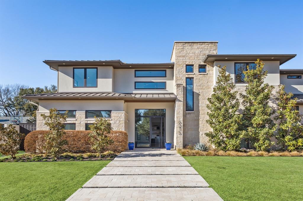 Timeless transitional built by Garvey Custom Homes offers 6,318 sq ft of thoughtfully designed living on beautifully landscaped .389-acre lot. Featuring 5 ensuite bedrms, 5.1 ba, this home seamlessly blends refined architecture w everyday comfort. Stone & stucco exterior, complemented by metal roof, sets tone for the quality craftsmanship found throughout. Inside, hardwood floors span both levels, enhanced by beautiful lighting & open expansive living spaces designed for both formal entertaining & relaxed living. 1st flr primary suite is a true retreat with private sitting area overlooking the backyard, dual vanities, freestanding bathtub, oversized walk-in shower, dual custom closets & direct access to loggia. Gourmet chef’s kitchen appointed w Thermador appliances includ 48” gas range w griddle, 2 dishwashers, 24” convection oven, built-in microwave & 24” built-in wine refrigerator.  Additnl appliances includ built-in True refrigerator & freezer,  Scotsman ice maker & 2 True refrigerator drawers. Breakfast rm & butler’s pantry make space ideal for entertaining. Main level further include a formal dining rm, family rm w gas FP & built-ins & living rm w sliding doors to backyard. Downstairs guest suite, study, mudrm, & utility rm add functionality to main level. Upstairs, 3 additional ensuite bedrms w walk-in closets surround a spacious game rm complete w wet bar & beverage refrigerator. Designed for year-round enjoyment, the covered outdoor loggia ft a sitting area, gas FP & built-in heaters, overlooking pool & spa w water feature. A covered side patio w built-in grill enhances the home’s entertaining capabilities. Additional highlights include whole-house generator, Savant smart home system, security & cameras & 4-car garage w epoxy flooring & storage. A rare offering in Preston Hollow w close proximity to Royal & Forest shopping centers & Northaven Trail, this exceptional property delivers elevated design, premier amenities & effortless indoor-outdoor living.