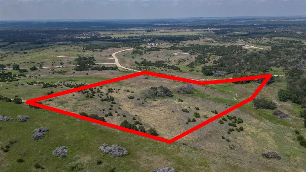 Experience the beauty of Central Texas from one of the higher-elevation tracts in this premier gated community in Hamilton County. This exceptional property offers gorgeous long-range views and an ideal setting for building your forever home. Located just a short 10 minute drive from Hamilton and roughly an hour from Waco—with easy access to both Dallas and Austin within a couple of hour, this homesite blends privacy, convenience, and natural beauty.
The community has several impressive new homes and high-quality builds, going up on surrounding tracts. The growth of the neighborhood adds tremendous value and appeal, creating a welcoming environment while maintaining the peaceful, wide open feel that Central Texas landowners appreciate.
Whether you’re looking to build a custom home, a weekend retreat, or an investment property, this tract offers the perfect combination of elevation, scenery, and location. Don’t miss the opportunity to own land in one of Hamilton County’s most sought after gated developments.