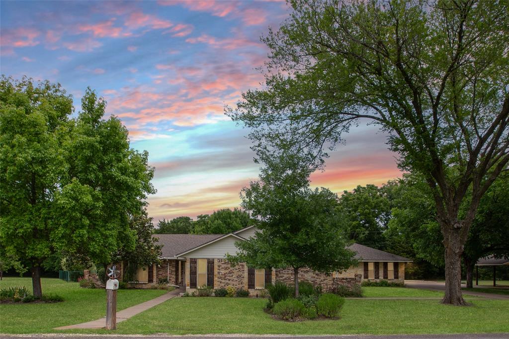 Welcome Home to your private oasis at 107 Oak Creek, nestled in the highly sought-after community of Ovilla, Texas. This exceptional 6 Bedroom, 4 Bathroom Ranch-Style Estate sits on a 2.5 ACs Seasonal Creek Side Home near the end of a quiet, dead-end street. This Well-Maintained Large Family Home Offers a blend of Texas Freedom & Country Essentials. This maybe the Perfect Multigenerational Layout:
The Primary Retreat: Features a Spacious Suite, Two Closet layout with a Private Ensuite Bathroom. 
In-Law Suite: A rare, Internal 2 Room In-Law Suite, complete with a Private Full Bathroom. 
Flexible Bedrooms: Four Additional Bright Bedrooms with Spacious Walk-In, Step-In or Reach-In Closets for Family, Guests or Hobbies.
Dedicated Home Office: A Private Home Office Provides a quiet place for Remote Work OR an Efficient Home Gym.
Backyard Oasis: Step outside to your own Private Paradise featuring a Sparkling In-Ground Swimming Pool Inside the Fenced Backyard.
Acreage & Privacy: Enjoy 2.5 Acs of Beautiful Semi-Wooded space that offers endless possibilities for Outdoor Activities, Gardening or Relaxation. Vehicles & Storage: A spacious 2 Car Garage & Carport for 2 provides Excellent Parking Options & a Sizable Barn Shaped Storage Bldg too.