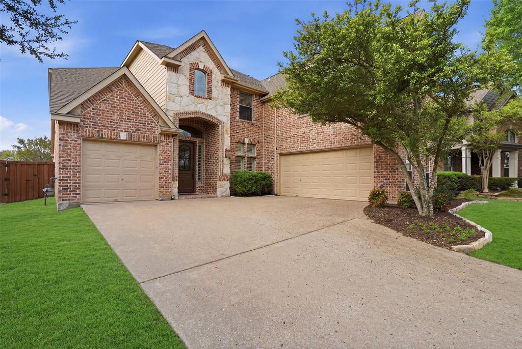 Discover the epitome of elegance in this magnificent 5-bedroom, 4-bathroom estate, crafted by renowned Shaddock Homes. Nestled on a generous north-facing lot in the highly sought after community of Hidden Creek, this architectural masterpiece offers elevated living with meticulous attention to detail and impeccable finishes. Upon entering, be captivated by the stunning two-story foyer, highlighted by a grand spiral staircase that serves as the home’s striking centerpiece. Expansive handscraped hardwood floors flow seamlessly throughout the main living areas, exuding warmth and sophistication. The luminous great room, adorned with soaring vaulted ceilings, is awash with natural light, creating an inviting ambiance for gatherings. Culinary enthusiasts will revel in the state-of-the-art kitchen, featuring premium Samsung appliances, a central island, and a convenient butler’s pantry for seamless entertaining. The delightful blend of form and function continues in the adjacent dining and living areas, with numerous windows that bring the outside in. The first-floor primary suite is a sanctuary of serenity, offering unparalleled comfort with its spa-inspired bathroom and expansive closet space. Designed for both relaxation and entertainment, this home boasts a sophisticated office, a dedicated media room for immersive viewing experiences, and an enormous multipurpose room allowing for endless customization—from a fitness center to a playroom. Storage is abundant, perfectly integrating practicality without compromising style. Venture outside and enjoy the tranquility and expansive space afforded by the large lot, ideal for creating your dream outdoor living area. In this exquisitely designed Shaddock home, luxury meets functionality, offering an extraordinary lifestyle in the heart of McKinney. Experience the perfect blend of comfort, style, and modern convenience that this exceptional property provides.