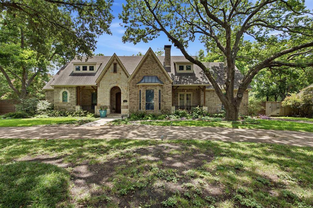 Prepare to be captivated by this move-in ready luxury estate in coveted Casa Linda Estates. Fully reimagined in 2022, this 2008 masterpiece perfectly balances sophisticated entertaining with comfortable everyday living. The airy, open floorplan welcomes you with 6-inch white oak floors, custom paint, designer wallpaper, and upscale lighting.    The culinary enthusiast’s kitchen is anchored by a massive storage island and features a premium Bertazzoni appliance suite, alongside a built-in Miele coffee maker and steam oven. Flexible living spaces flow effortlessly, including a bright sunroom, a family room, and a cozy den tucked off the main living area.  Retreat to the luxurious primary suite with its spa-inspired bath, or utilize the three generous guest bedrooms—including one private ensuite—all boasting walk-in closets and plantation shutters. Outside, a chef-ready paradise awaits: a sparkling pool with a bubbler tanning ledge, an attached spa, a pergola with an outdoor fireplace, and a built-in grill and bar. The expansive covered patio is fully equipped with ceiling fans, TV hookups, and built-in speakers for year-round hosting.  Exceptional curb appeal is defined by a sweeping circular driveway, additional guest parking, mature trees, and professional landscaping. Listing agent must be present at all showings. ** PUBLIC OPEN HOUSE Sunday July 19 11:00-1:00 **No Sign In Yard**