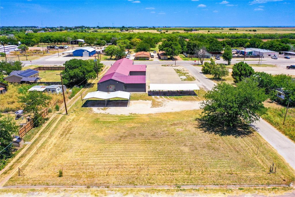 This vacant lot has improvements such as water and electricity in the area and the carport currently on the property will also be conveyed. The property is well-located and would work well for a multitude of purposes. The lot would be ideal for new construction, a commercial space, storage units or overflow parking. The lot is easily accessible off of US Business 277 and ready for a new owner.
