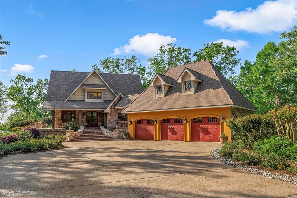 Welcome to 335 White Perch — a custom-built home on nearly 7 private acres along the stunning Toledo Bend Lake! Designed with a warm, rustic cabin feel, this home features open windows in the kitchen and living room, offering breathtaking lake views. The kitchen is a true standout with beautiful sinker cypress cabinets that add timeless charm.

The main living area includes 6 bedrooms and 4.5 bathrooms, featuring two secluded upstairs rooms—one being the master suite with serene lake views—while the remaining bedrooms are conveniently located downstairs with a full bathroom. A private on suite above the garage offers a perfect mini retreat for guests or extended stays.

In addition to the primary living space, the property includes approximately 2,400 sq ft of heated and cooled bonus space located between the garage and on-suite, providing flexible-use areas such as an office, hobby space, or recreation rooms. This additional space is not included in the main living square footage. The home offers approximately 9,000 sq ft total under roof, including living areas, garage, and bonus spaces.

The heated and cooled garage includes a convenient bathroom and ample storage throughout the property ensures room for everything from lake gear to cabin essentials. Spend your days boating, fishing, or relaxing at the boathouse with a full kitchen and unforgettable lake views. This peaceful lakeside retreat is ready to create lasting memories with family and friends. Schedule your private showing today!