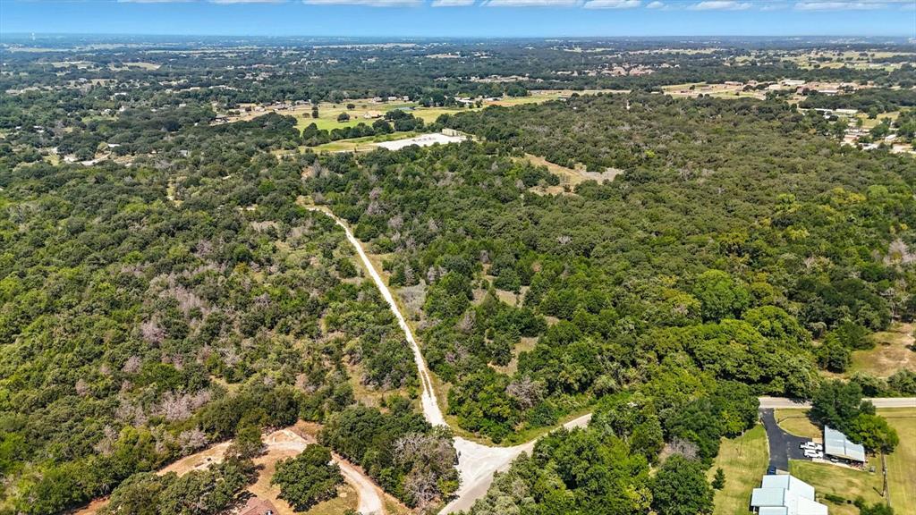 Discover 78 acres of opportunity in the heart of Azle, Texas. This expansive property offers endless potential—whether you’re looking to build your dream ranch, create a private retreat, or explore residential development. With a prime location just minutes from Eagle Mountain Lake and within easy reach of Fort Worth, this land blends country living with city convenience. The terrain features scattered mature trees, and plenty of space for livestock, recreation, or future building sites. Road access makes it simple to bring your vision to life, and the acreage provides privacy while still being close to schools, shopping, and major highways.

Properties of this size and location are rare—don’t miss the chance to own a piece of Azle’s growing community.