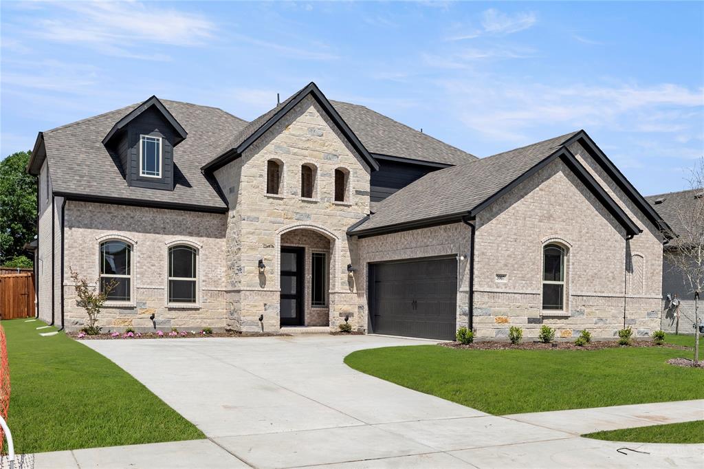 MLS# 20899608 - Built by Windsor Homes - Ready Now! ~ Come tour the beautiful Sugar Land Plan with rear covered patio, 8 Ft Doors, 5.25 inch Base Boards,10 ft ceilings downstairs, Double Ovens, Built in gas cook top, Wood vent hood, Custom Cabinets, Pot & Pan drawers,  Wood floors, Oversized Master shower with seat ,Large Kitchen Island w Pendant lighting, Level 5 Quartz Countertops in Kitchen, Upgraded Kitchen Backsplash Upgraded floor & shower wall Tile, Framed Mirrors in Master & Powder Bath, Quartz countertops in Master & Bath 2, Fireplace, Rain Glass @ Master Tub Window, additional storage cabinets in all baths, Full Sprinkler & Gutters, 6ft Cedar  fence Extended Covered Patio & much more!!