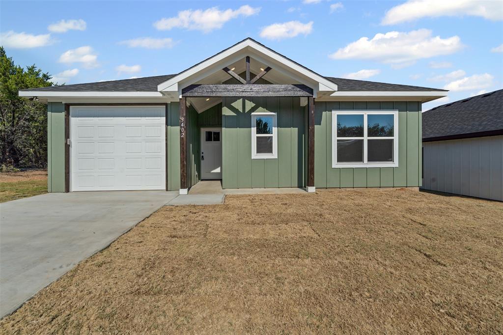 Awesome opportunity to own a BRAND NEW HOME at entry level pricing! Hard to find a new build at this price in Granbury! Built with modern features like a wide open floorplan, wood-look tile throughout, granite counters, custom stained cabinetry, kitchen island, stainless steel appliances, light and open, modern paint schemes, custom tiled bathrooms, large bedrooms, spacious master with custom en suite bath and walk-in closet, freshly landscaped yards, and tons of potential for customization. Built with energy star systems, double-paned windows, tons of insulation, electric WH, efficient HVAC, all means huge savings on utilities. Come see this one and the one next door before they're gone! Don't miss this opportunity to get a new and modern home at an awesome price!