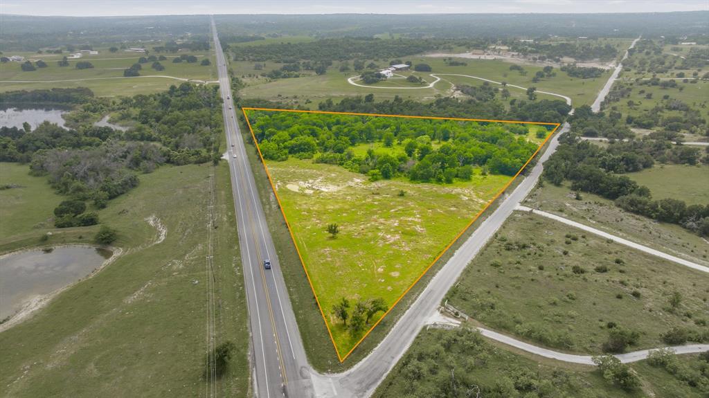 Fantastic and unrestricted 14 acres!! Check this one out! Located just north of Stephenville on US Hwy 281 at the corner of Hwy 281 and CR164! This property offers so many opportunities and potential uses! The visibility and traffic count is second to none! This could be an excellent commercial lot or a great spot for a new home! This type of opportunity to purchase unrestricted acreage is getting fewer and farther in between! So if you are looking for something like this, come take a look and see if its the one for you! The boundary lines in the photos are estimates! Please refer to the survey in the transaction desk for the exact boundaries!