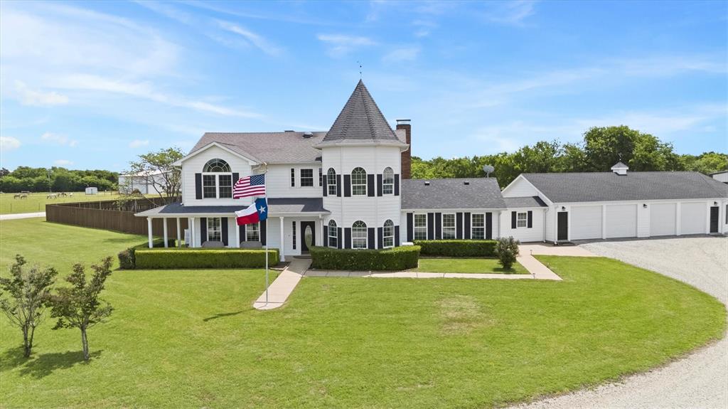 Discover a slice of serene countryside living with this exquisite 3760 sq ft farm and ranch property, boasting a generous four-car garage. Ideally situated on 27.36 acres, this home is a haven for both equestrian enthusiasts and those seeking tranquil rural escapes. Meticulously updated interiors complement the sprawling outdoor spaces that celebrate traditional ranch living with modern ease.  Step inside to find tastefully updated interiors that harmonize contemporary comforts with rustic charm. The spacious living area features an open floor plan accentuated by abundant natural light, creating a warm and inviting atmosphere. The gourmet kitchen is a chef's dream, equipped with double ovens, an oversized island with a breakfast bar, and a huge pantry. The primary suite offers a private retreat with a luxurious ensuite bath featuring an oversized shower and soaking tub.  The exterior of this property is an equestrian's delight featuring an 8,400 sq ft show barn with 18 large stalls (9 with Dutch doors and paddocks) plus a 720 sq ft tack room with AC, heat, and a full bathroom.  Great for your barn manager.  The well-appointed barns offer ample storage and oversized stalls, complemented by a 200 x 100 professional riding arena with cushion sand and side screens tailored for all skill levels. For guests, the detached quarters ensure comfort, privacy, and convenience, making it perfect for long or short stays. With its blend of stunning interiors, vast riding and leisure facilities, and a location that speaks to the heart of country living, this ranch-style property invites prospective owners to experience a lifestyle of freedom, peace, and endless possibilities.  5 RV Hookups.  Multi-parcel ID currently in agricultural exemption. Don't miss the opportunity to call this piece of Texas paradise your home. Pond.  An additional 17 acres with an airplane hangar and grass runway is available as well.   No plane the hangar would make a great additional barn with pasture.