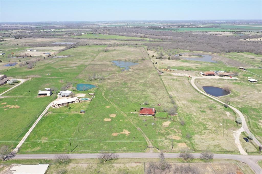 Exceptional 25.3+ acre opportunity in the heart of rapidly growing Royse City!  Located within the highly acclaimed Royse City ISD, this versatile property offers the perfect blend of investment potential and county living.  Currently AG Exempt and situated outside the ETJ, this track provides flexibility for a variety of future use.  Utilities are available at the road with easy access to I-30.  

Featuring county road frontage, a large stock pond, full perimeter fencing, and an existing barn, this property is ideal for development, a private estate, equestrian use, or long term investment.  With no HOA and multiple homesite possibilities, the opportunities are endless.

An additional 75+ contiguous acres may also be available, creating the potential for an approximately 100 acre assemblage.  With new development already underway nearby, city sewer and water may be available in the future, further enhancing the property's development potential.  

Whether you’re looking to develop a small residential community, build your dream ranch, or a create a multi-generational family compound, this property offers a rare opportunity to bring your vision to life!  Conveniently located just 30 minutes to Downtown Dallas and 15 minutes to Rockwall, this tract offers both immediate usability with exceptional future upside. 

Call today to schedule your private tour and explore the possibilities.  Seller may consider owner financing on the 25.3-acre tract with approximately two-thirds down and remaining balance financed by seller subject to mutually agreeable terms.