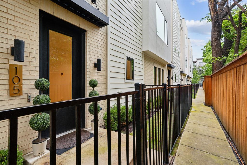 Welcome to high-end, luxury living in this exquisite urban townhome. Nestled in a prime location near Old Parkland, downtown, and the Texas Stock Exchange, this three-level condo is a haven of style and comfort. Boasting 3 bedrooms and 3.5 bathrooms, this residence exudes sophistication and is outfitted with designer finishes and top-quality materials throughout, including solid white oak hardwood floors and 10-foot ceilings that enhance the expansive, open-concept design. The gourmet kitchen is a chef’s dream, featuring a premium oversized island with quartz countertops, high-end Bosch appliances, a special AGA Elise series range with stylish white cabinetry and a handy walk-in pantry with abundant storage space. Natural light floods the living areas through large picture windows equipped with high-end shades, offering both privacy and refinement. The primary bedroom serves as a serene retreat, complete with beautiful views of mature trees and a spa-inspired en-suite bathroom featuring a free-standing tub, large shower, dual sinks, and a generous walk-in closet. Every additional bedroom also includes its own en-suite bath for ultimate convenience. Functional spaces abound, including a ground-floor study nook, a mudroom, a 2-car garage with plenty of extra storage and EV CHARGER. Exclusive DOG PARK on the property. To top it all off, ascend to your private rooftop sanctuary to entertain or relax on the patio while enjoying panoramic views. Ideally located just minutes from the Katy Trail, Turtle Creek, Uptown, and some of Dallas’ best dining.