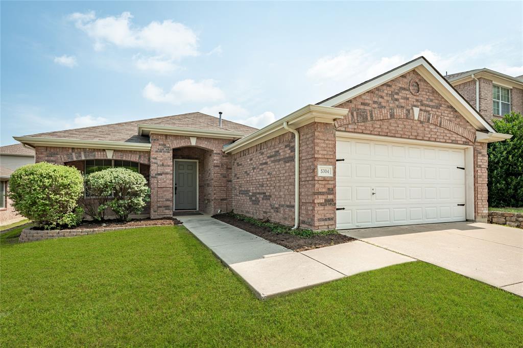 Charming & full of character, this impressive home offers an inviting open floor plan designed for both comfortable living & effortless entertainment. Ideally located just steps from the HOA community pool, scenic lake perfect for fishing fun, park, & playground, the location is very convenient. The beautifully updated kitchen is truly the heart of the home, featuring extensive granite countertops, attractive white tone cabinetry, breakfast bar seating, & a spacious layout ideal for gathering. Just off the entry, the versatile front room offers endless possibilities as a formal dining room, home office, music room, second living area, or even a game room for a pool table. The generous living area showcases the stylish decorative barn doors & a design filled with warmth, personality. The private primary suite is thoughtfully separated from the two bedrooms, creating a peaceful retreat complete with a stunning ensuite bath featuring a freestanding soaking tub, stylish shower, dual sink vanity, & updated designer lighting with a special touch of a barn door to give privacy. Beautiful architectural details set the tone from the moment you enter, including a striking entry light fixture, elegant archway opening into the living and kitchen areas, & extensive wood-look ceramic tile flooring throughout the main living spaces. Secondary bedrooms are split from other rooms & complemented by an updated secondary bath.  Additional highlights include a spacious utility room with room for a refrigerator or freezer, oversized garage, extended covered front porch, & a generously sized backyard perfect for relaxing & outdoor enjoyment. Located within highly sought-after Prosper Independent School District. Exceptional location to arterial routes, retail, employment, grocery stores, employment areas such as Raytheon, Baylor, Scott & White Hospital & minutes to nationally acclaimed McKinney downtown Historical District. Quick move-in. Stunning, fun & refreshing updates.