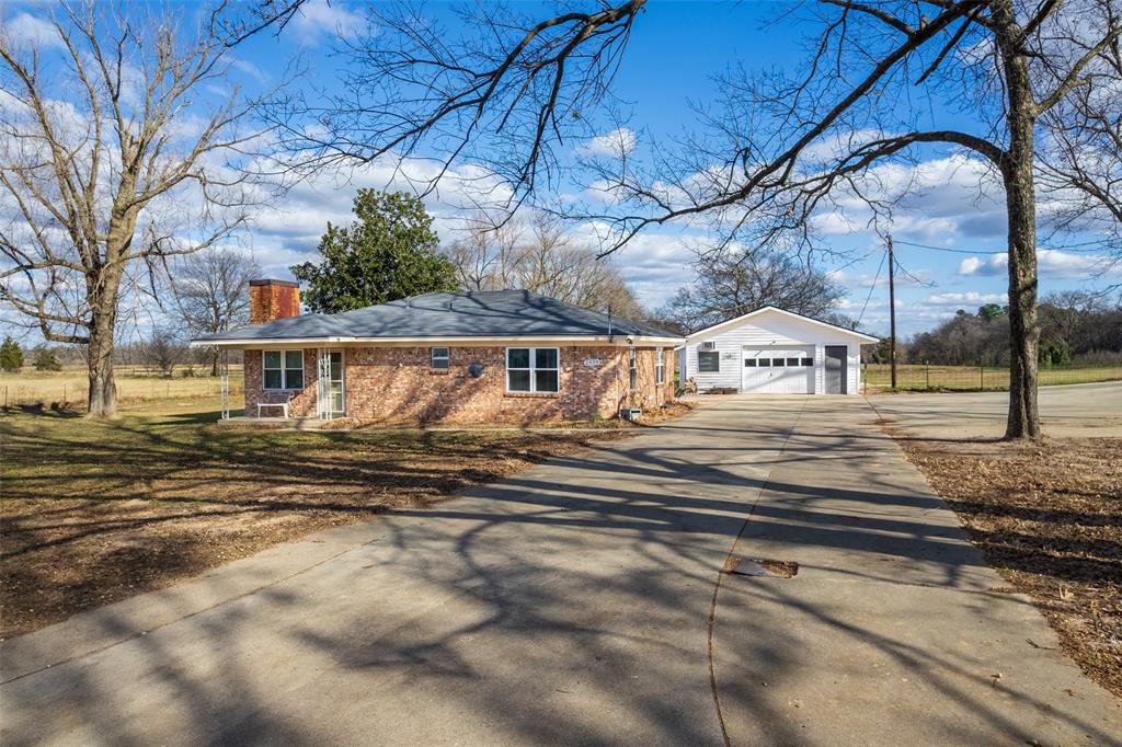Seller is Motivated!! Bring Offers!! Overall price reduction of $10,000 on this Well-maintained country property just outside Mount Vernon offering space, functionality, and recent updates. The homefeatures 3 bedrooms, 1.5 baths, and a newly remodeled kitchen with all new matching Samsung stainless steel appliances, including range-oven, microwave, dishwasher, refrigerator, washer, and dryer. The home offers 1,309 square feet ofcomfortable living space and is move-in ready. Situated on 3.378 acres, the property includes a 1,500 square foot shop that could also serve as a 5-car garage with an office and half bath. A concrete driveway and parking area provide excellentaccess. The land is fenced and cross-fenced and includes a chicken coop, animal stalls, and four large pecan trees—ideal for animals, hobbies, or peaceful country living.