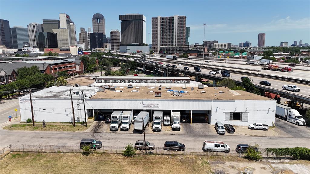Commercial warehouse conveniently located in the heart of downtown Dallas near the Dallas Farmers Market and Deep Ellum. Situated on highly accessible S. Good Latimer Expressway with convenient access to major highways, this commercial facility is ideal for produce distribution, food service operations, cold storage, or wholesale supply businesses. The property features multiple refrigerated room and dedicated cold storage areas for those temperature-sensitive inventory. Spacious warehouse areas provide flexible storage and operational capacity, while multiple loading docks allow for streamlined shipping and receiving operations. Features include climate controlled refrigerated storage rooms, large warehouse and distribution space, multiple grade level and dock high loading areas, office space, truck access, high visibility to N Central Expressway, road frontage on S. Good Latimer Expressway and Taylor Street, conveniently location in downtown Dallas, easily accessible from major interstates. Don't miss this opportunity! This property offers functionality, accessibility, and prime urban positioning in one of Dallas' most dynamic commercial corridors.