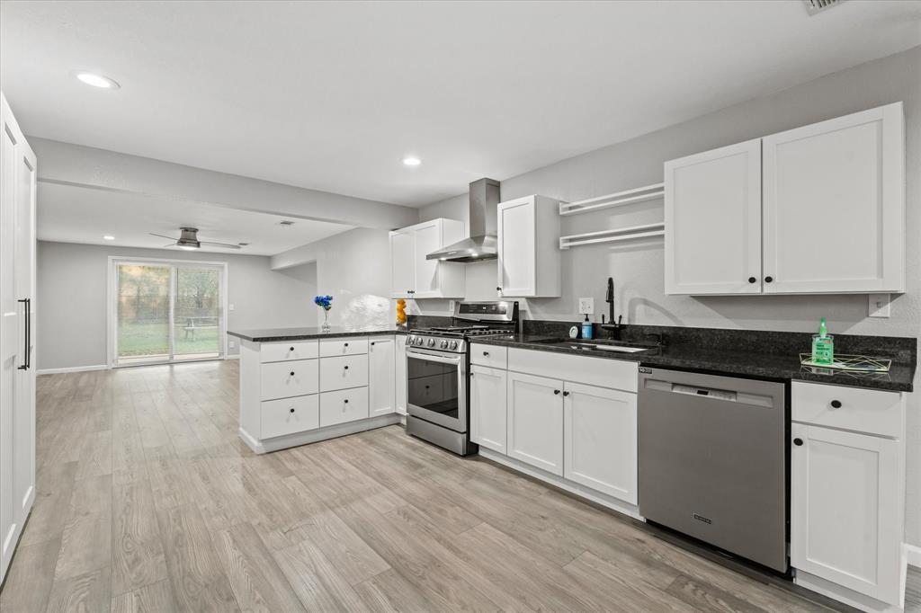 Newly renovated GEM 8 miles from downtown with easy access to all freeways.The seller spared no expense when upgrading this beautiful home.From luxury vinyl plank and gorgeous tile flooring, granite countertops,gas stove, stainless steel appliances,new cabinetry, open concept with wonderful natural lighting, beautiful fixtures, hardware & lighting, updated HVAC,new water heater, updated electrical &plumbing,new windows, updated bathroom with impeccable custom finishes, fresh interior& exterior paint,oversized bedrooms&closets,huge laundry room with new cabinetry, iron fence,completely fenced throughout,spacious backyard perfect for entertaining, plenty of parking space,& shed for storage. Schedule your showing today! Must See! New pics without glares will be uploaded soon.
