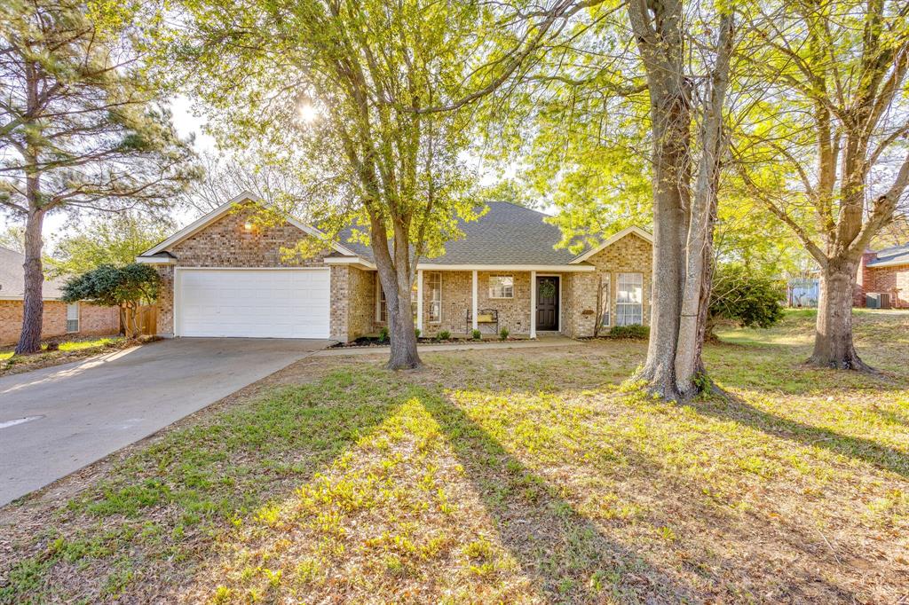 Located in the sought-after Mountain Valley neighborhood, this charming home offers a layout that feels easy, functional, and comfortable from the start. The living room welcomes you in with large windows, great natural light, and a cozy wood-burning fireplace that gives the space a warm, inviting feel. From there, the home flows into the kitchen and dining area, keeping the main living spaces connected while still giving each area its own purpose. The kitchen has been nicely updated and is set up well for everyday use, with a peninsula and bar seating that works great for quick meals, morning coffee, homework, or visiting while dinner is being made. You’ll appreciate the counter space, storage, and the way the light carries through the room. The bathrooms have also been tastefully refreshed, and throughout the home you’ll notice updated interior paint and carpet, and newer light fixtures that help everything feel clean and move-in ready. The primary suite is tucked away from the secondary bedrooms and offers two spacious walk-in closets, which is such a nice bonus and not something you always find. A separate laundry room adds convenience and keeps the daily clutter out of sight, making the home even more practical. Outside, both the front and back porches are covered, giving you extra places to enjoy your morning coffee, unwind in the evening, or sit outside without being in direct sun. The fully fenced backyard has room to relax, play, garden, or make it your own, and the storage shed stays with the property, giving you a great spot for tools, lawn equipment, or anything else you need tucked away. Mountain Valley is an established neighborhood with mature surroundings and a welcoming feel that people love. You’re just minutes from shopping, dining, and everyday essentials, with quick access to I-35W and Highway 174 for an easy commute. Refreshed in all the right places, this home is ready for its next owner to move in and enjoy.