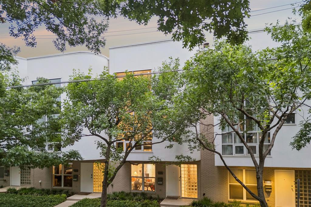 Architectural brilliance meets high-energy urban living in this AIA award-winning masterpiece by renowned architect Ron Wommack. Perfectly positioned in the heart of the Uptown-Knox corridor, this residence offers an unrivaled lifestyle just steps from the Katy Trail, Cole Park, and West Village. The interior is a celebration of light and scale, anchored by a dramatic two-story great room featuring exposed steel I-beams, hardwood floors, and a fireplace. The gourmet kitchen is a bold design statement, featuring high-gloss cobalt and white cabinetry, a striking textured mosaic backsplash, and a premium stainless appliance suite with a built-in wine cooler.

The second-level primary suite serves as a serene retreat with a spa-inspired bath with a skylight illuminating the space. Crowned by a versatile third-floor loft—ideal for a home office or den—the home transitions seamlessly to a massive private rooftop deck. This outdoor oasis is protected by a custom permanent arched canopy with an integrated ceiling fan, creating the ultimate venue for year-round entertaining. Experience the pinnacle of design-forward living in one of Dallas' most walkable and vibrant neighborhoods.