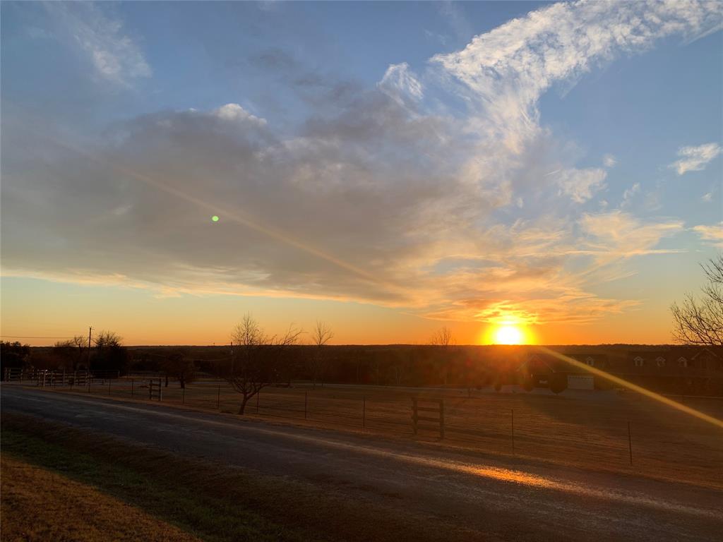 Sitting High on a hilltop this residential lot has an amazing view to the west. You can literally see for miles. Beautiful sunsets, quiet neighborhood, and a short drive time to US 75 the gateway corridor.  It is a quaint 4 lot subdivision phase one.