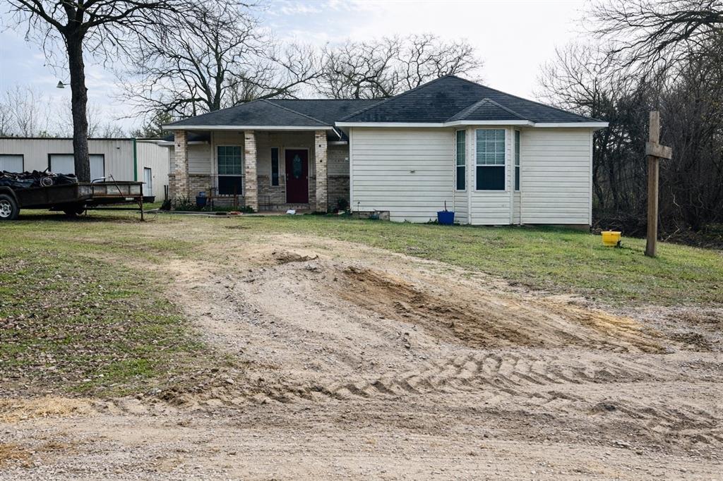 ***MOTIVATED SELLER**Investor opportunity in Eustace! This 4-bedroom, 2-bath single-family home offers approximately 2,100 sq ft of living space plus an additional 2,000 sq ft shop featuring its own bathroom. Property is currently in foreclosure and priced accordingly. Interior features include tile and carpet flooring, original kitchen and bathrooms, and an HVAC system that is only 2 years old. Vinyl siding exterior with city water and sewer services. Foundation may need some work. Electrical is original. Roof age, plumbing type, and water heater age are unknown. No basement. Great potential for investors, flippers, or buyers looking to add value with updates and repairs.