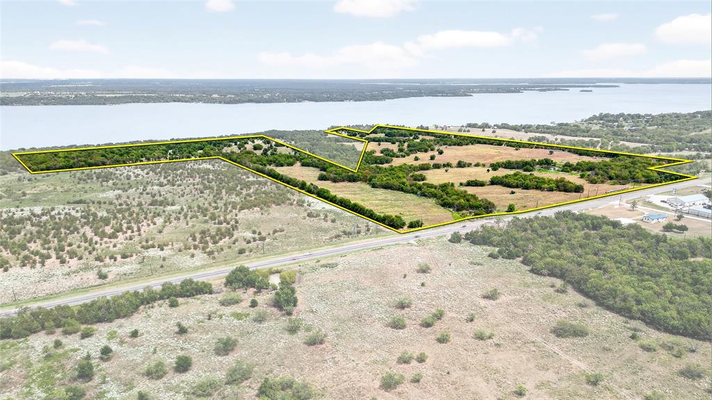 Prime 110 acre tract with direct lake frontage, offering exceptional potential for residential or mixed-use development. Just an hour from Dallas, this rare property features expansive views, natural topography, and nearby utilities—ideal for a master-planned community or private waterfront estates. A standout investment opportunity in one of North Texas’ fastest-growing recreational markets.