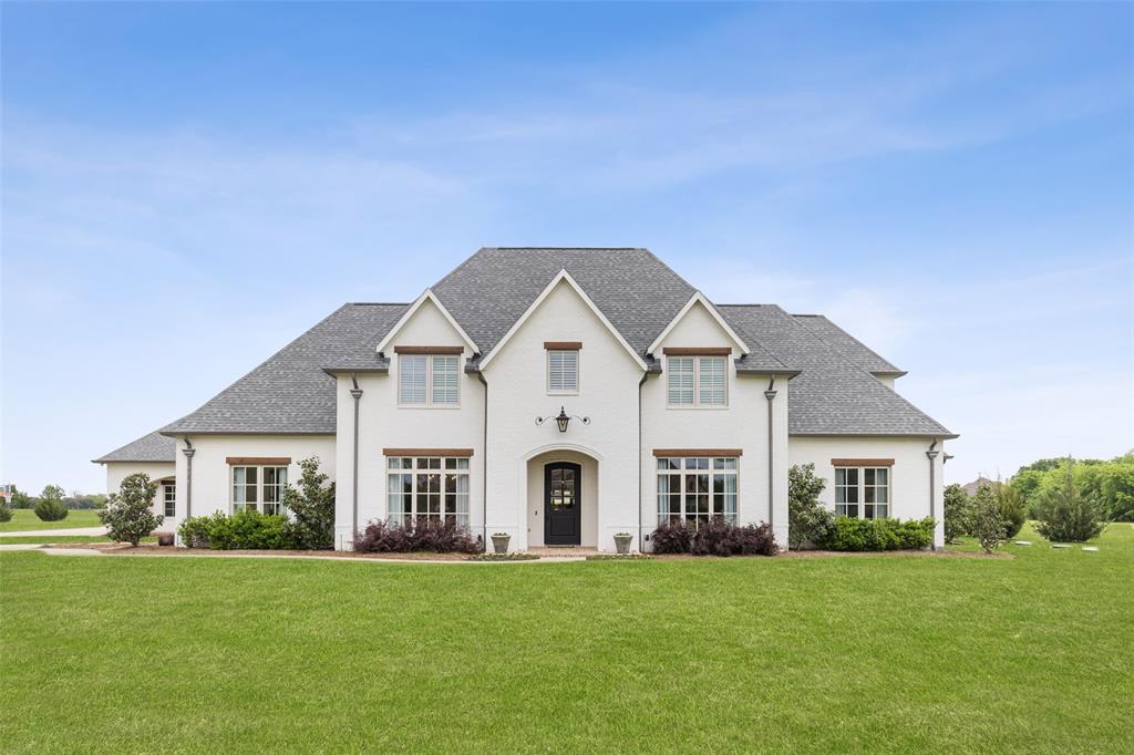 Transitional masterpiece situated on over 4 acres in one of the few gated communities in the highly desired Lovejoy ISD.  Built in 2015, this home features high-end luxury design and custom details including a custom iron front door, casements windows, hand scrapped hardwoods, mahogany French doors, marble countertops, wooden ceiling beams, designer lighting & plumbing fixtures and 2 full masonry fireplaces with gas starters. Energy seal insulations system, tankless water heater, mud room, incredible closet space and storage throughout in addition to a spacious bonus room upstairs are just a few extras not to be missed. Beautiful, covered patio with tongue and groove wooden ceiling and herringbone brick pattern floor complete with an outdoor grill and fireplace. Incredible opportunity awaits as this large lot can easily accommodate a pool, sport court and guest house.  Oversized 3 car garage with epoxy floors.