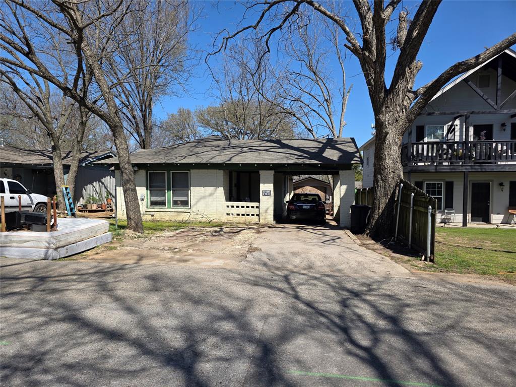 So many options. Handyman special. Full of possibilities and packed with potential, this 2-bedroom, 1-bath, 1 car carport home in Cleburne can be yours.  Whether you’re looking for your 1st home, wanting to down size or build your investor portfolio. This home is ready for a new owner to add their personal touch and restore its full sparkle. Home features a large kitchen. Utility room for full washer and dryer.  Nice fenced backyard. Conveniently located near schools, parks, shopping, and downtown amenities. Home is occupied by long time tenant. Home can also be packaged with 4 other homes that are offered for sale as well. All MLS# for properties offer for sale 21211282, 21211302, 21214411. 21214430 and 21214445. Home and property are being sold “as-is” “where-is”.