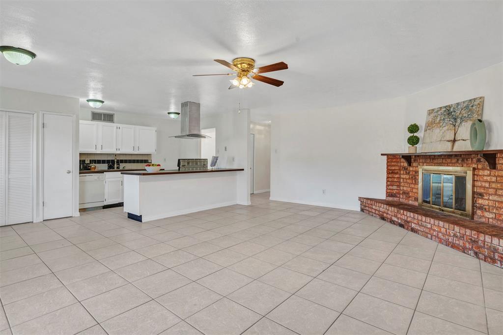 Allen TX under $300,000? It is your lucky day! Charming 3 bedroom home in the highly desired Allen ISD vacant and move in ready. The open living room is anchored by a brick woodburning fireplace with hearth for snuggling up to a cozy fire. The living flows to the breakfast area and kitchen.  The owner's suite boasts large walk in closet and en suite bath with walk in shower. The secondary bedrooms are a good size and close to the primary bedroom, great for young families. The home offers great storage.  Nice sized backyard has spacious covered patio and plenty of room for pets and kids to run and play.  Convenient to major thoroughfares, schools, shops and dining. Great home for first time home buyers, downsizing or investment.  Check it out!