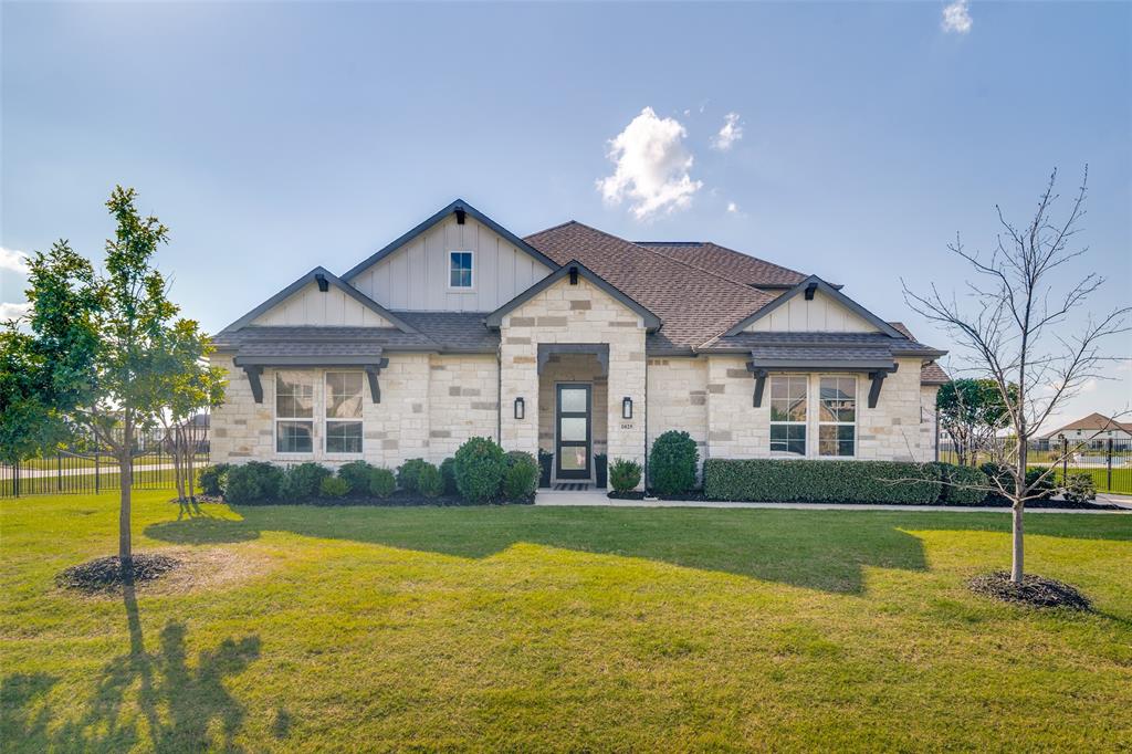 Embrace a lifestyle where comfort and luxury converge. This timeless yet modern home should have its own Pinterest page sitting on over an acre in an exclusive Lucas neighborhood. You are welcomed by the striking stone façade outside and the grand foyer inside. Do what brings you joy by hosting gatherings in your spacious living room that is bathed in natural light from gorgeous panoramic windows or cozy up for a quiet evening…either way this home brings the vibe. The kitchen is the pulse of the home with its expansive island and cohesive space all the while maintaining it show piece status. Envision quality time in your owner’s suite where winding down and catching your breath are easy. The primary bathroom is an actual personal sanctuary. Productivity is the theme for the private office as it provides a haven for work and creativity. Giving you room for all that you pack into your day, the layout of this home just simply makes sense. Four bedrooms and four bathrooms provide seamless comfort, and the game room upstairs is perfect for whatever you want it to be! Year-round enjoyment is provided by the covered back patio where relaxing and playing is a given. ?The open space beyond the property line is a non-buildable area, which offers even more privacy.
Come experience what life should feel like and where countless cherished memories can be made.