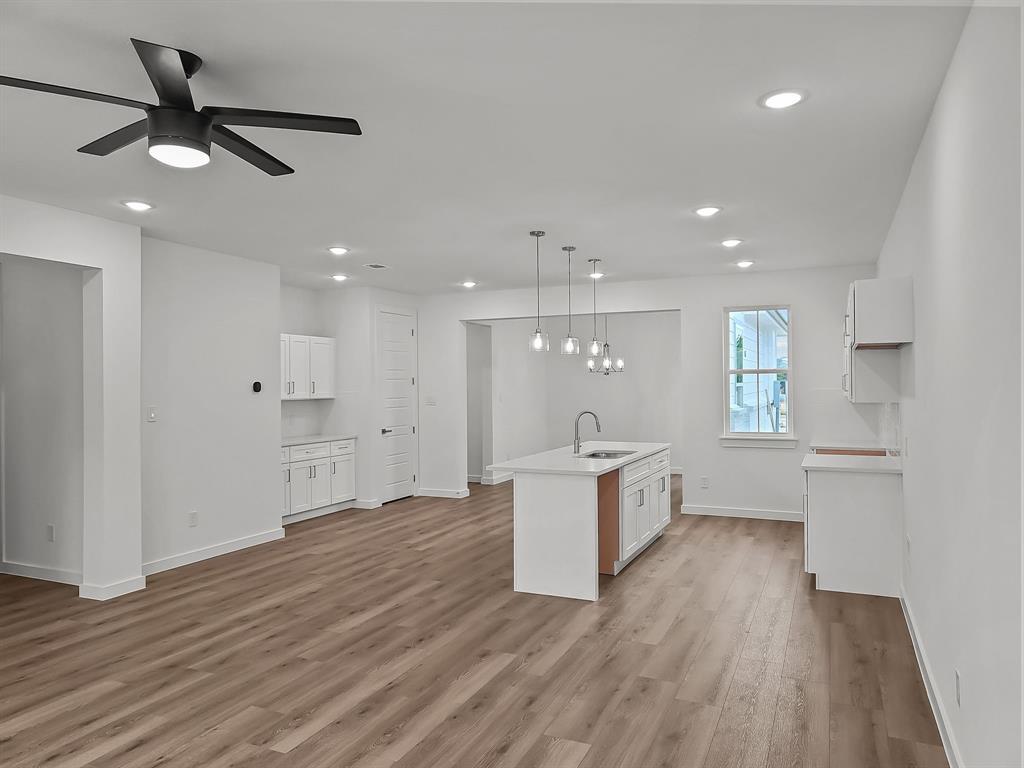 Located in the top-rated Eagle MT-Saginaw ISD, this 2025-built townhome offers modern living in a prime Fort Worth location near shopping, dining, and entertainment. Enjoy an open-concept layout with luxury vinyl plank flooring, a chef-inspired kitchen featuring stone countertops, SS appliances, and designer finishes. The upstairs primary suite boasts a spa-like bath with dual sinks and a walk-in shower. Two spacious secondary bedrooms and a full bath complete the second level. Backed by a 1-2-10 builder warranty for peace of mind. Don't miss this incredible opportunity!