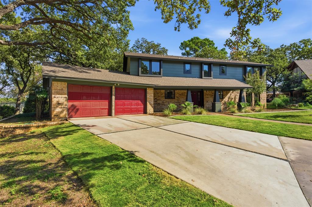 Tucked at the end of a quiet cul-de-sac near Arlington’s Entertainment District, this reimagined, fully renovated, five-bedroom, three-and-a-half-bath home offers over 3,100 square feet of modern design and unexpected flexibility. The thoughtful floor plan accommodates nearly any lifestyle—from multigenerational living to ample space to work and unwind at home. The main level features expansive living and dining areas with views of the backyard and a touch of intrigue: a hidden “secret door” concealed in the wood-slatted dining room wall. The kitchen has been fully overhauled with sleek new cabinetry, appliances, a service bar with sink, and a breakfast nook that catches the morning light. A first-floor suite with an en-suite bath serves as a second primary bedroom, ideal for guests and extended family. Upstairs, the main primary suite is a retreat unto itself, complete with a spacious sitting area, two generous walk-in closets, and a spa-inspired bath featuring an oversized wet room with dual rain-head showers and a freestanding soaking tub. An additional upstairs bedroom with a Jack-and-Jill ensuite includes a matching sitting area overlooking the backyard, while the remaining bedrooms offer the flexibility for an office, nursery, studio, or gym. Outside, the large covered patio and pergola invite year-round outdoor living, with plenty of space to design a full kitchen or lounge. Two new HVAC systems, fresh paint, new landscaping with a new back yard fencing to be installed in the coming weeks, and a clean, contemporary aesthetic bring this home fully up to date—all within minutes of AT&T Stadium, Globe Life Field, and Texas Live, and ideally positioned between Dallas and Fort Worth. Perfectly blending space, style, and setting, this Arlington gem offers a rare combination of modern comfort and timeless versatility in the heart of the Metroplex. Schedule your showing today!