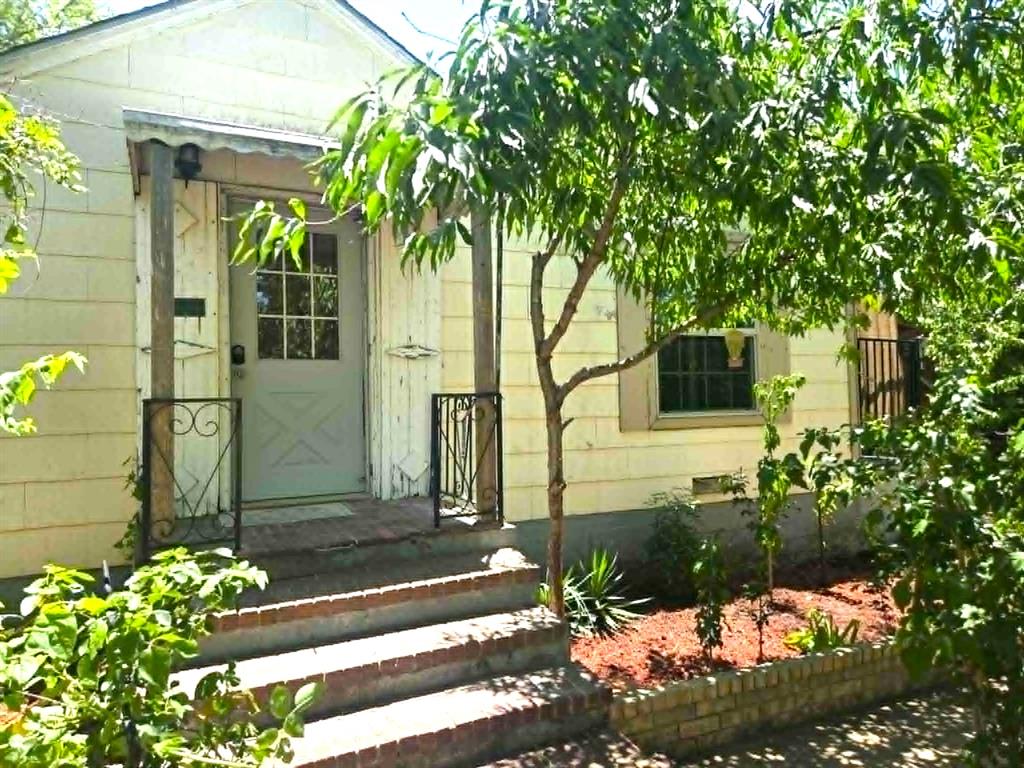 Affordable opportunity with room to make it your own! This 2-bedroom, 1-bath home offers 879 square feet of living space on a spacious 0.16-acre lot in Fort Worth. Inside you'll find updated vinyl plank flooring in the main living areas and the bathroom, a functional floor plan, generously sized bedrooms, and a kitchen featuring a stainless steel gas range, built-in microwave, and abundant cabinet space. The bathroom features new flooring, toilet and vanity. Outside, the large lot provides mature shade trees, plenty of parking with three covered carport spaces, a storage shed. Whether you're looking for your first home, an investment property, or a project with upside potential, this property offers an excellent opportunity at an affordable price. Conveniently located with easy access to shopping, dining, schools, and major highways. Bring your ideas and make this property your own! For financing information, contact listing agent for a flyer for potential financing information.